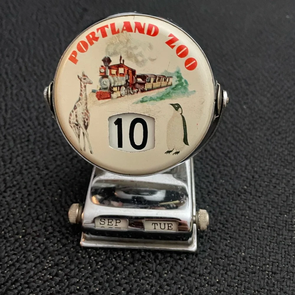 VTG metal perpetual flip calendar featuring Portland Zoo graphic